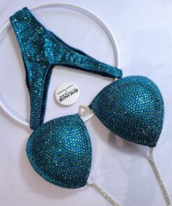 Bikini de competencia IFBB en tonos azules y verde agua marina conectores de dos hileras. BikinisFitness